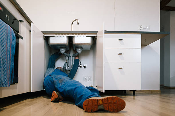 Professional Emergency Plumber technician working in Berne, IN